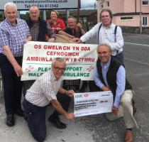 President Kevin, treasurer Gwyrfai with officials of the VOC Tractor Club